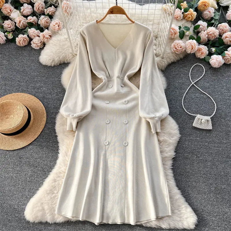 Autumn And Winter Sweater Dress Women Korean Slim V-Neck Double Breasted Bubble Long Sleeve Knitted A Line Dress Pullover T1638
Autumn And Winter Sweater Dress Women Korean Slim V-Neck Double Breasted Bubble Long Sleeve Knitted A Line Dress Pullover T1638