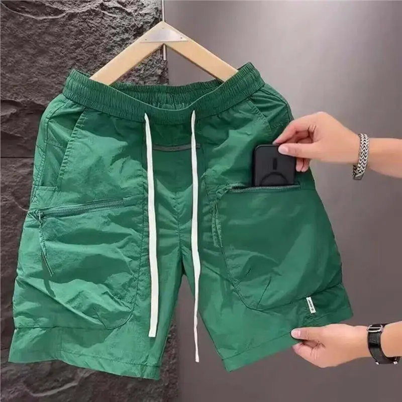 Summer New Men's Loose Fit Quick Dry Cargo Shorts Beachwear Casual Sporty Four-Quarter Inseam Zipper Workwear mid Waist
Summer New Men's Loose Fit Quick Dry Cargo Shorts Beachwear Casual Sporty Four-Quarter Inseam Zipper Workwear mid Waist