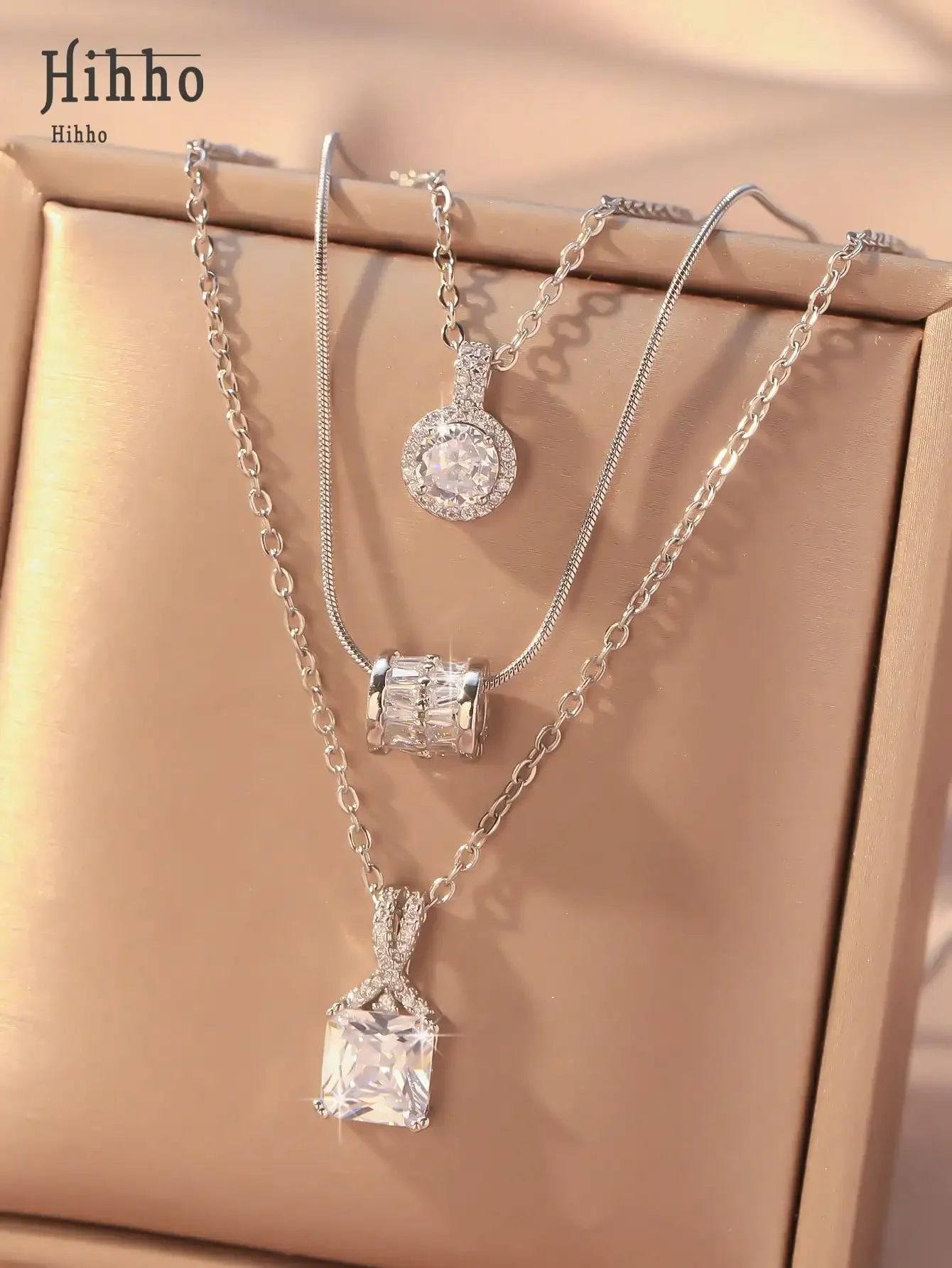 3-Piece Layered Crystal Pendant Necklace Set for Women, Geometric Design
3-Piece Layered Crystal Pendant Necklace Set for Women, Geometric Design