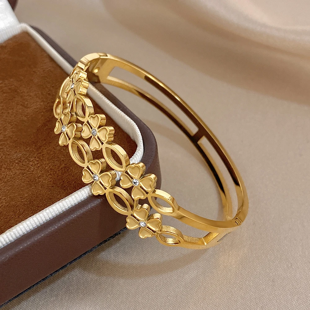 Elegant Hollow Oval Flower Splicing Stainless Steel Bangle for Women Doublelayer Waterproof Golden Spring Bracelet Daily Jewelry
Elegant Hollow Oval Flower Splicing Stainless Steel Bangle for Women Doublelayer Waterproof Golden Spring Bracelet Daily Jewelry