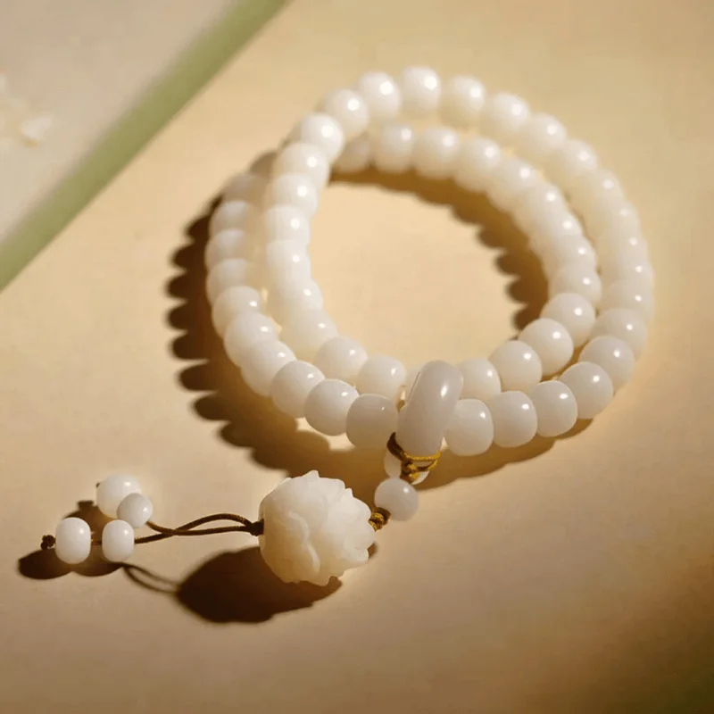 Natural white jade , bracelet, double-loop lotus pendant with tassel accessories, bodhi root raw beads
Natural white jade , bracelet, double-loop lotus pendant with tassel accessories, bodhi root raw beads