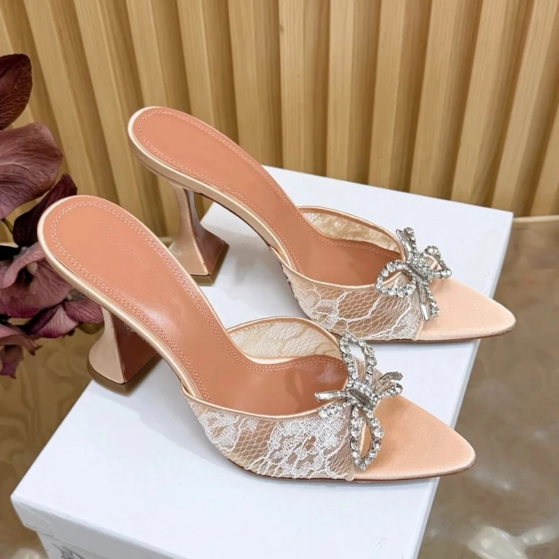European and American New Fashionable Lace Rhinestone Butterfly Buckle Pointed Toe Sandals Sexy Wine Glass and Women's Slippers
European and American New Fashionable Lace Rhinestone Butterfly Buckle Pointed Toe Sandals Sexy Wine Glass and Women's Slippers