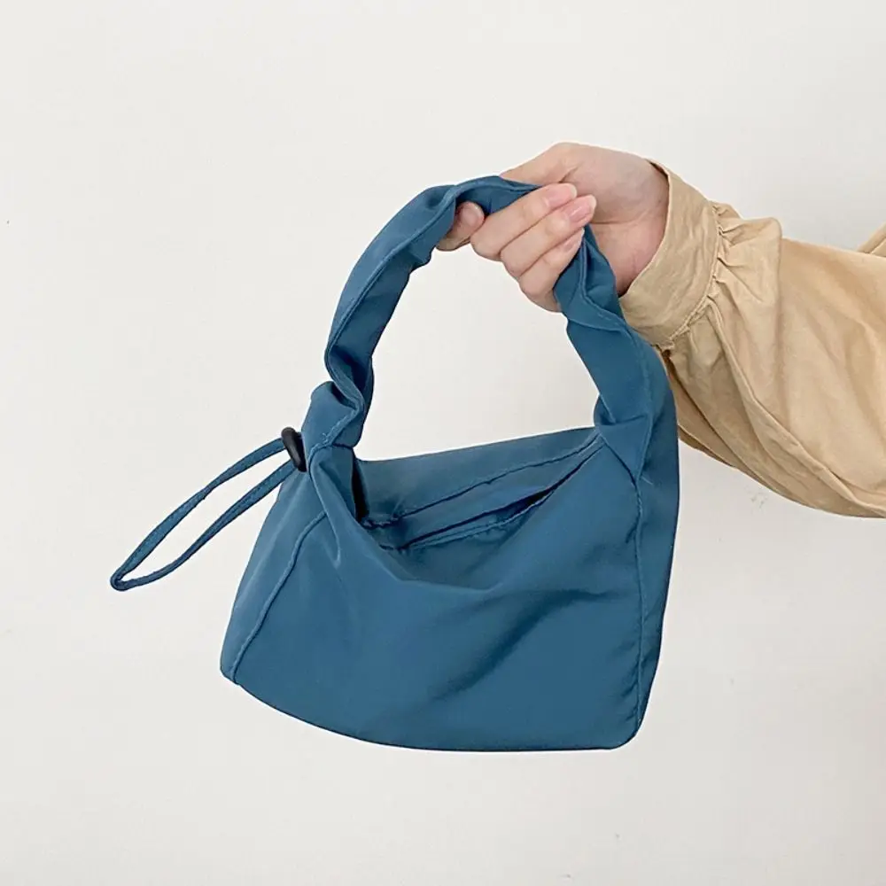 Nylon Drawstring Handbag Soft Japanese Style Pleated Straps Tote Bag Large Capacity Magnetic Buckle Solid Color Uderarm Bag
Nylon Drawstring Handbag Soft Japanese Style Pleated Straps Tote Bag Large Capacity Magnetic Buckle Solid Color Uderarm Bag