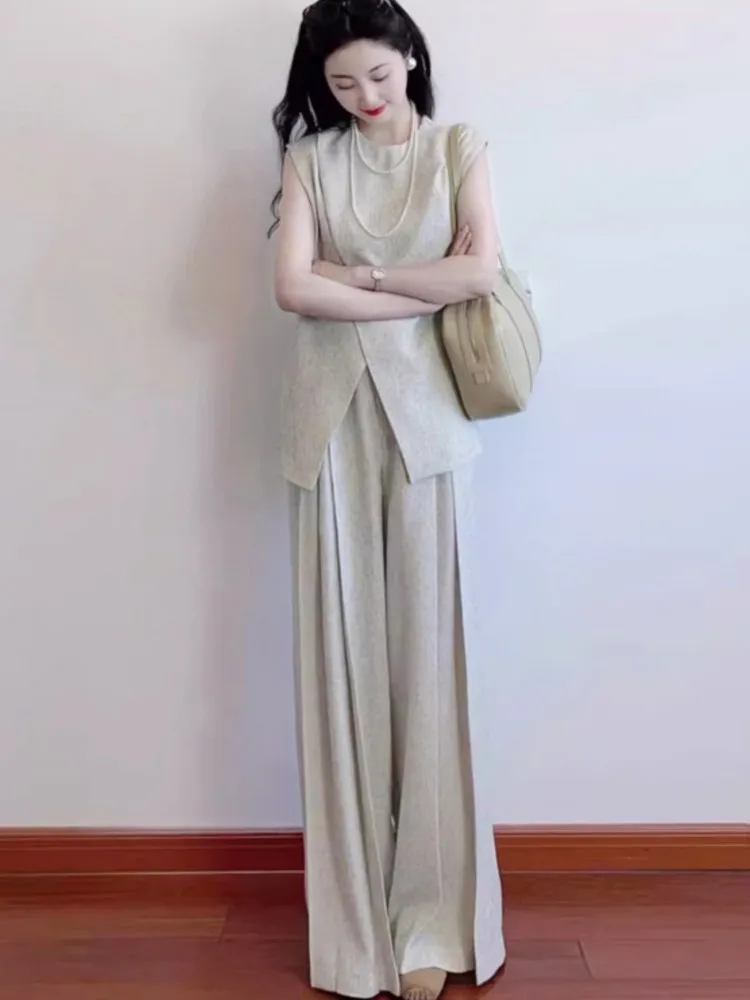 Women's two Pieces Set Fashion Summer Irregular Linen Vest Wide-leg Pants Suit High-Quality Temperament Draped Loose Cotton Slim
Women's two Pieces Set Fashion Summer Irregular Linen Vest Wide-leg Pants Suit High-Quality Temperament Draped Loose Cotton Slim