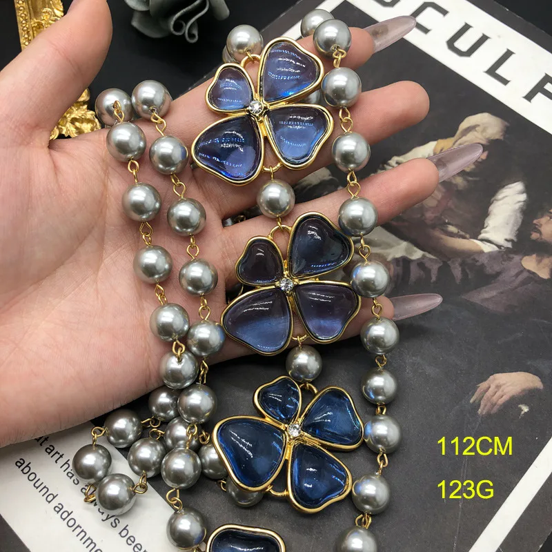 European and American retro palace glass Pearl purple four-leaf flower earrings necklace
European and American retro palace glass Pearl purple four-leaf flower earrings necklace