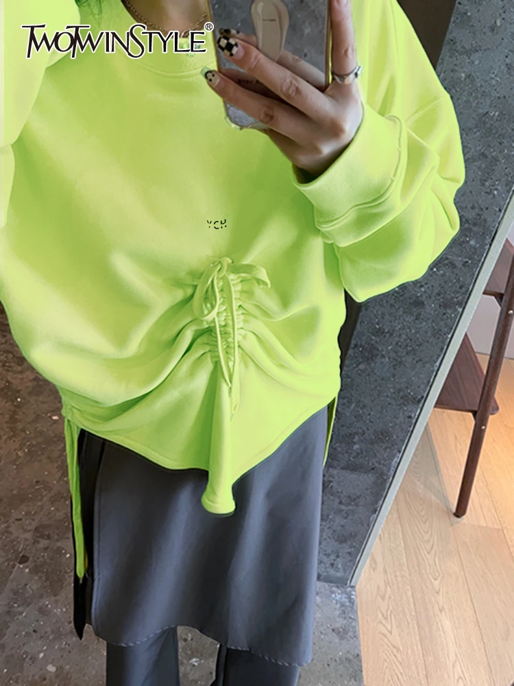 TWOTWINSTYLE Solid Irregular Sweatshirts For Women Round Neck Long Sleeve Drawstring Design Sweatshirt Female Fashion 2023 New
TWOTWINSTYLE Solid Irregular Sweatshirts For Women Round Neck Long Sleeve Drawstring Design Sweatshirt Female Fashion 2023 New