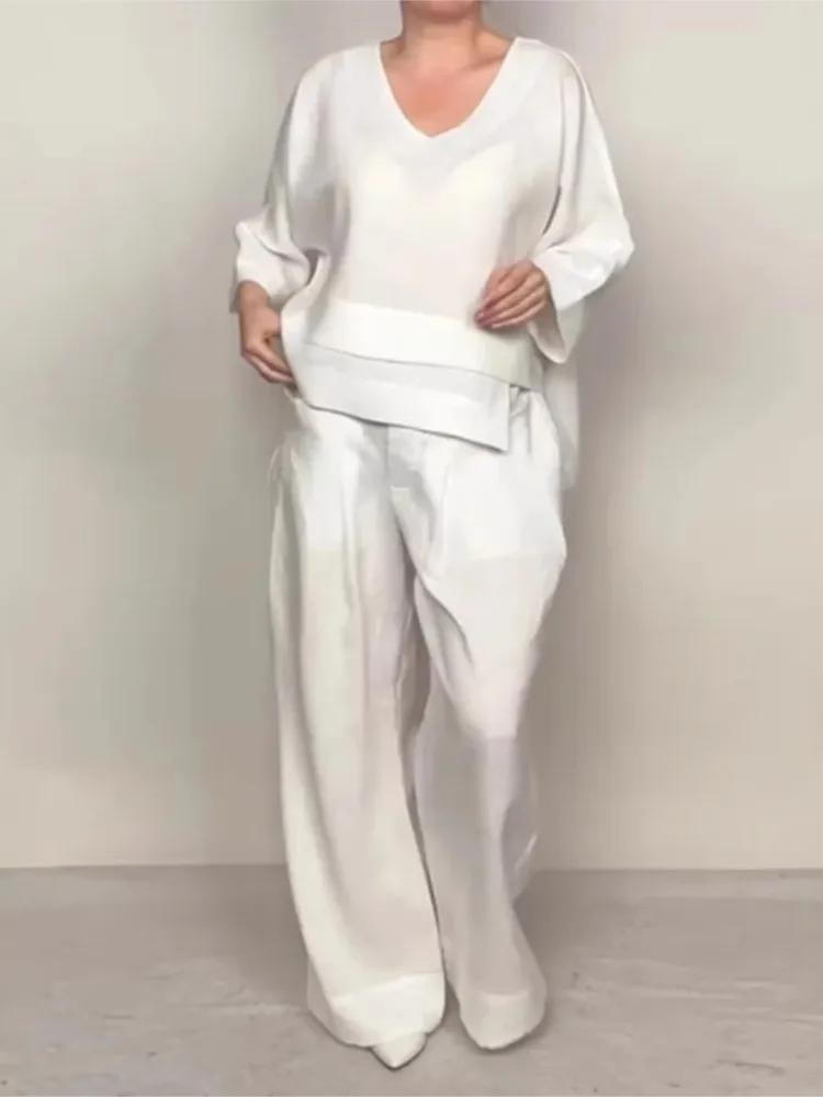 Women's Fashion Comfortable Casual Trousers Set Commuting Style Simple Solid Color Loose V-neck Top Wide-leg Pants Two-piece Set
Women's Fashion Comfortable Casual Trousers Set Commuting Style Simple Solid Color Loose V-neck Top Wide-leg Pants Two-piece Set