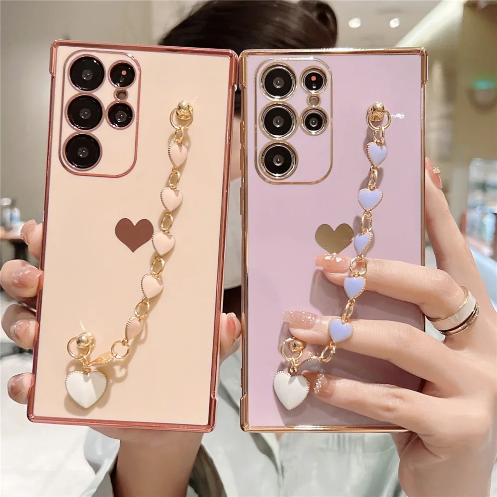 Shockproof Plating Love Heart Bracelet Chain Case for Samsung Galaxy S24 S23 S22 S21 Ultra S20 FE A15 A54 A53 A52 Phone Cover
Shockproof Plating Love Heart Bracelet Chain Case for Samsung Galaxy S24 S23 S22 S21 Ultra S20 FE A15 A54 A53 A52 Phone Cover