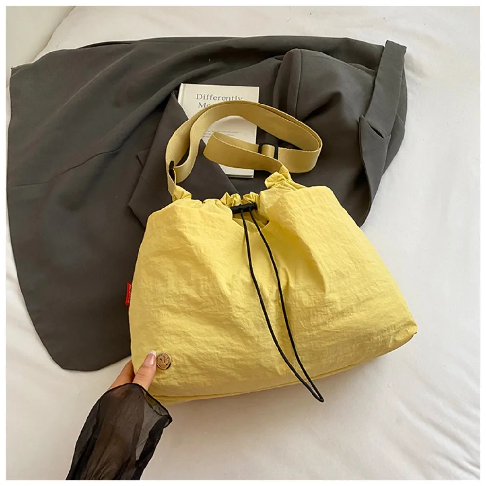 Korean Style Pleated Drawstring Bucket Bag Large Capacity Solid Color Nylon Shoulder Bag Waterproof Handbag Cloth Crossbody Bag
Korean Style Pleated Drawstring Bucket Bag Large Capacity Solid Color Nylon Shoulder Bag Waterproof Handbag Cloth Crossbody Bag