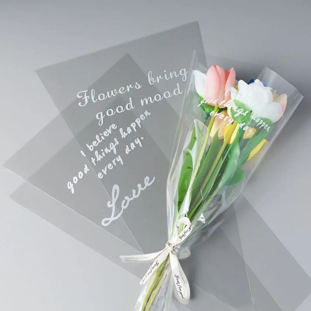 50Pcs Transparent Flower Packaging Bag Waterproof Plastic Bag Wrapping Paper Trapezoidal Package Supplies
50Pcs Transparent Flower Packaging Bag Waterproof Plastic Bag Wrapping Paper Trapezoidal Package Supplies