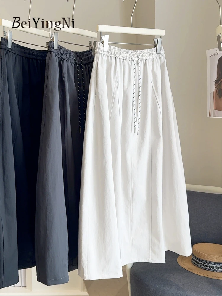 Beiyingni Summer New Style Women Skirts 2026 Casual Korean Midi Cargo Skirt Ladies Patchwork Drawstring BF Street A-line Skirt
Beiyingni Summer New Style Women Skirts 2026 Casual Korean Midi Cargo Skirt Ladies Patchwork Drawstring BF Street A-line Skirt