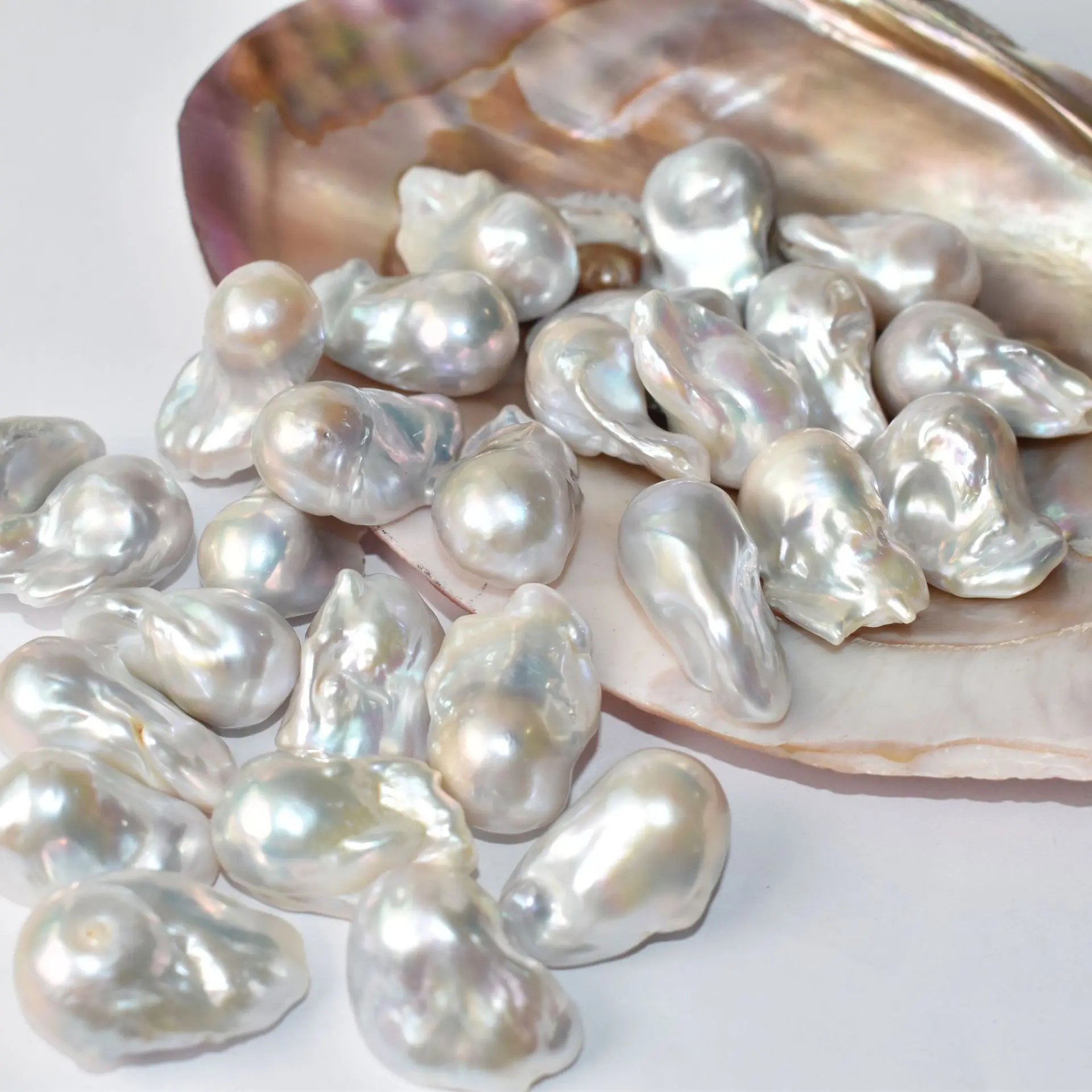 Natural freshwater pearl loose bead Fish tail pearl bead DIY accessories Cross without porous conformal beads
Natural freshwater pearl loose bead Fish tail pearl bead DIY accessories Cross without porous conformal beads