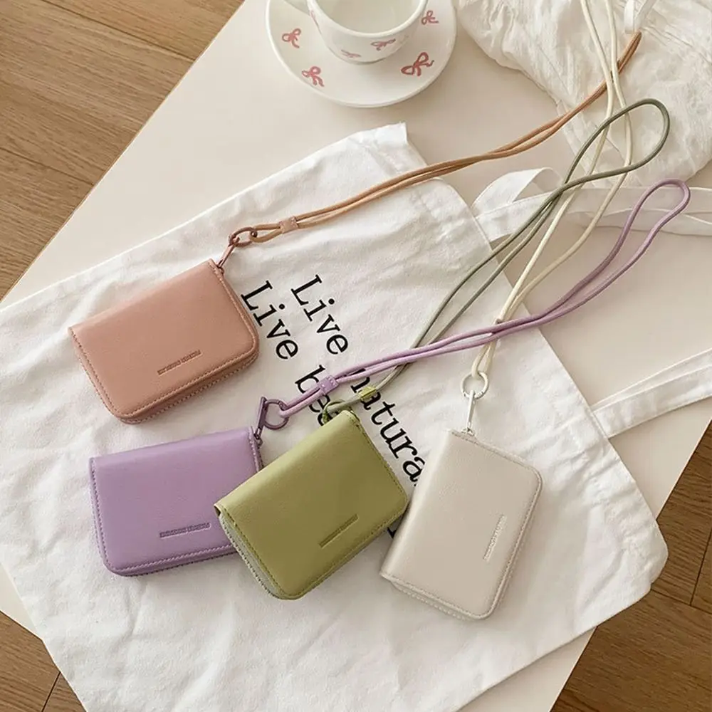 Модный мужской и женский кошелек на шею, однотонный короткий кошелек из искусственной кожи с ремешком на молнии, студенческий кошелек, сумка для карт
Модный мужской и женский кошелек на шею, однотонный короткий кошелек из искусственной кожи с ремешком на молнии, студенческий кошелек, сумка для карт