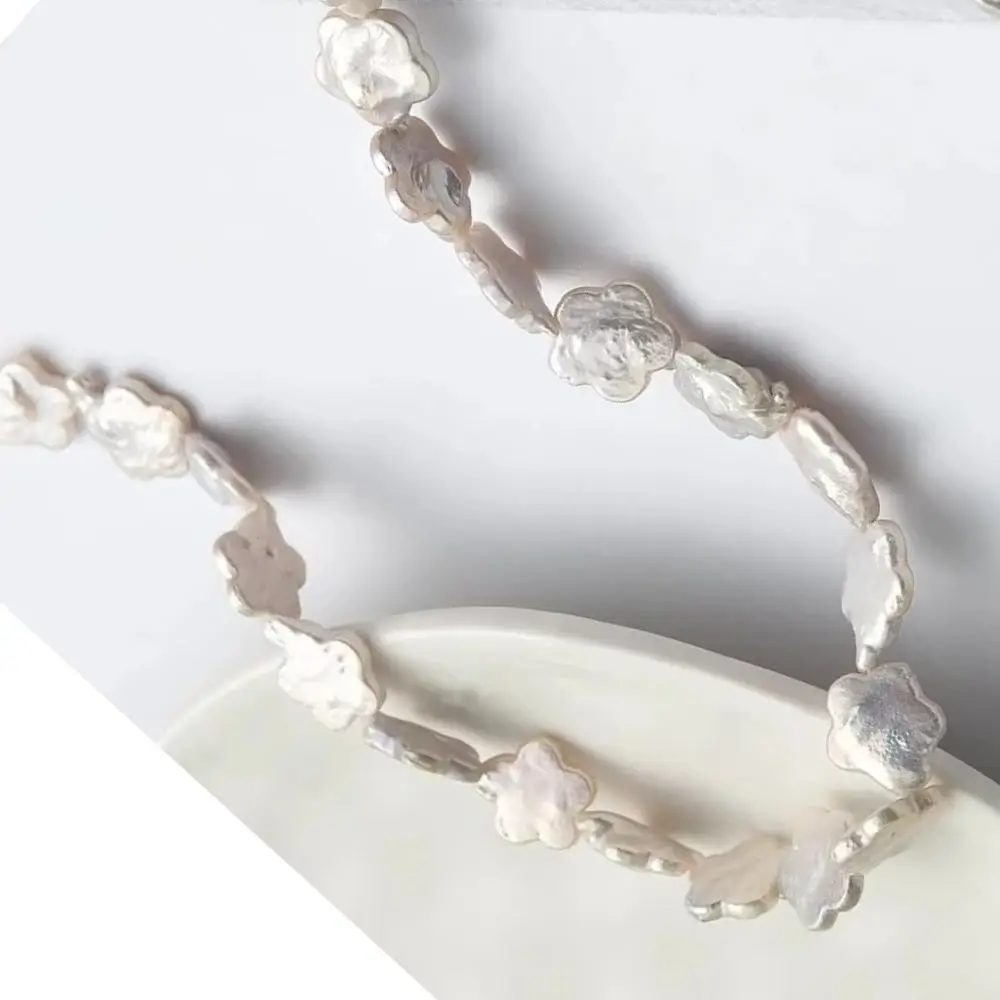 1Strand 12-16mm Natural Freshwater Pearl Bead String White Plum Blossom Shape Baroque Charms DIY Necklace Bracelets Accessories
1Strand 12-16mm Natural Freshwater Pearl Bead String White Plum Blossom Shape Baroque Charms DIY Necklace Bracelets Accessories