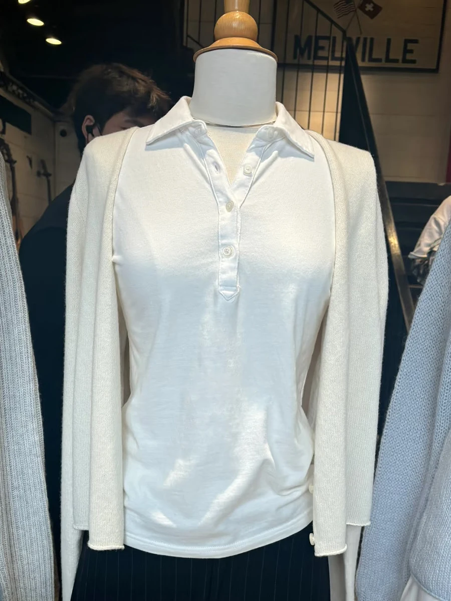 Белая хлопковая тонкая женская футболка три четверти, осенние новые футболки с отложным воротником и пуговицами, винтажные простые топы в консервативном стиле
Белая хлопковая тонкая женская футболка три четверти, осенние новые футболки с отложным воротником и пуговицами, винтажные простые топы в консервативном стиле