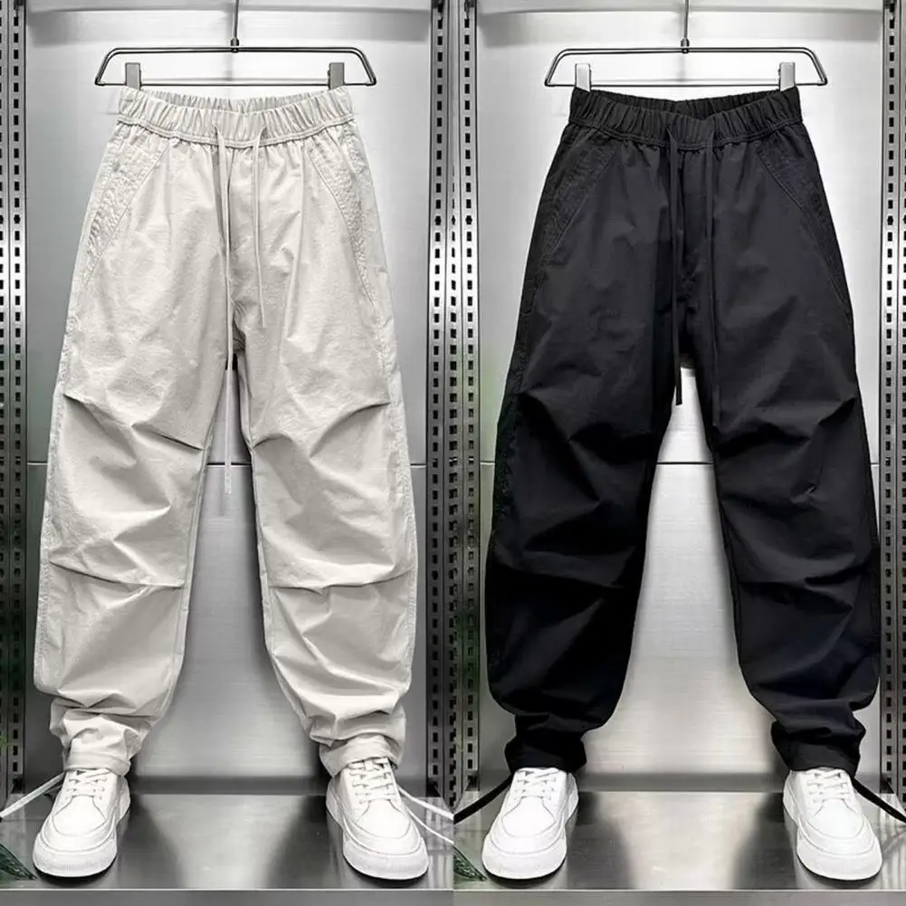 Men's Jogger Pants Drawstring Waist Cargo Pants with Pockets Loose Fit Casual Solid Color Sports Trousers for Street Travel
Men's Jogger Pants Drawstring Waist Cargo Pants with Pockets Loose Fit Casual Solid Color Sports Trousers for Street Travel