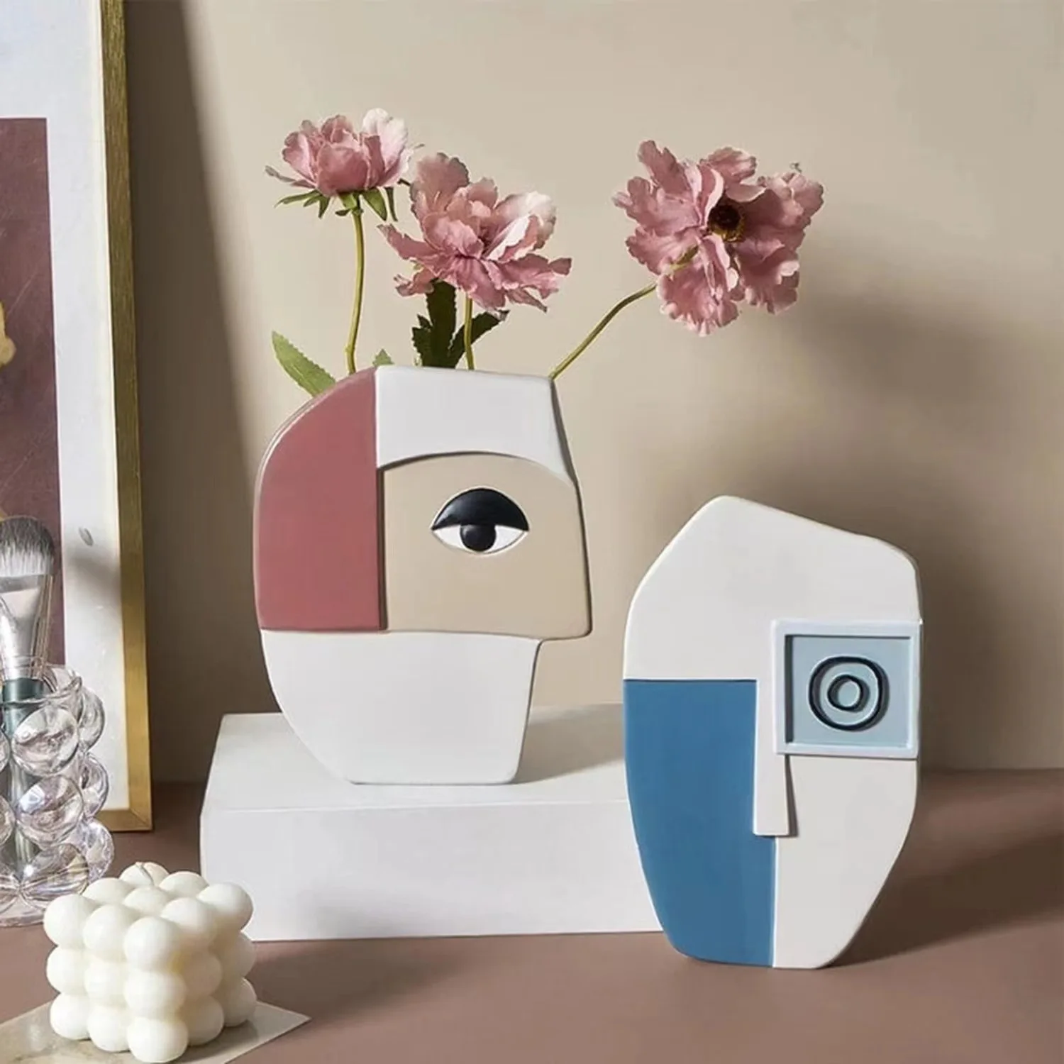 Nordic style vase with abstract face. Home decoration flower placement. Porch living room arts and crafts decoration.
Nordic style vase with abstract face. Home decoration flower placement. Porch living room arts and crafts decoration.