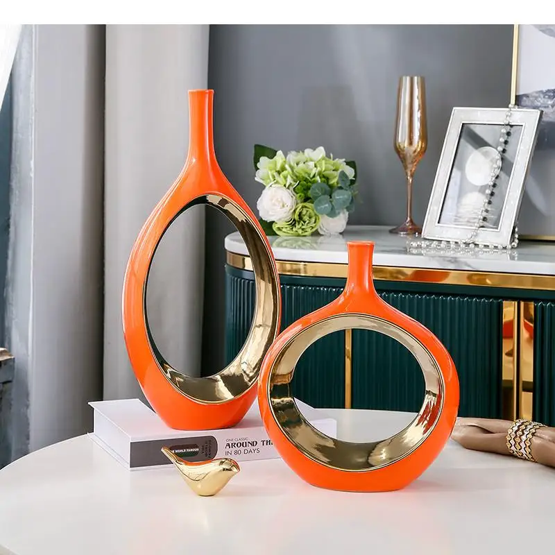 Ceramic Vase Golden Hollow Out Abstract Flower Arrangement Round Flower Vase Hydroponics Modern Home Decoration Accessories
Ceramic Vase Golden Hollow Out Abstract Flower Arrangement Round Flower Vase Hydroponics Modern Home Decoration Accessories