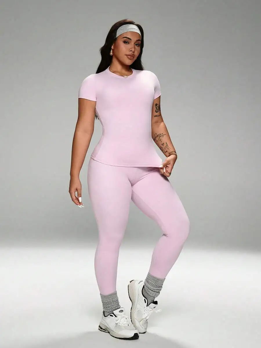 Comfortable 2-Piece Sportswear Set: Crew Neck T-Shirt & High-Waist Yoga Leggings, Stretchy Activewear for Women
Comfortable 2-Piece Sportswear Set: Crew Neck T-Shirt & High-Waist Yoga Leggings, Stretchy Activewear for Women