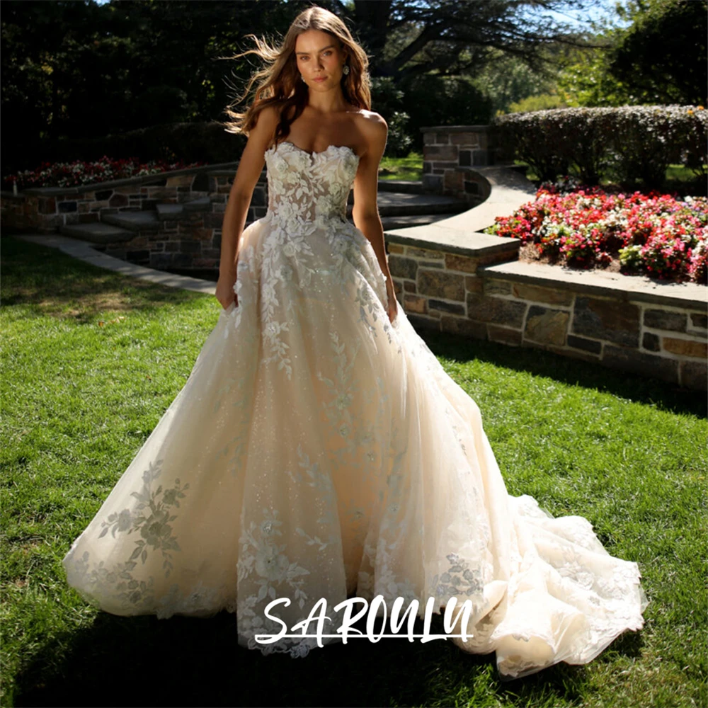 Glitter Tull Ballgown Wedding Dress with Rose Lace Appliques Strapless Bride Dresses for Women 2025 Sweetheart Bridal Gown
Glitter Tull Ballgown Wedding Dress with Rose Lace Appliques Strapless Bride Dresses for Women 2025 Sweetheart Bridal Gown