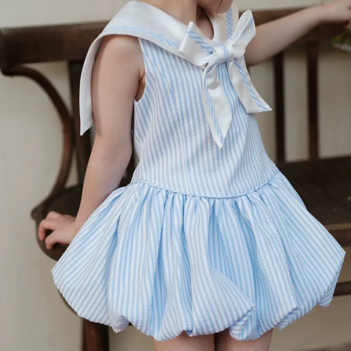 Girls' Navy Collar Blue Striped Dress Summer Fashion 2026 New Design Sense Children's Sleeveless Dress
Girls' Navy Collar Blue Striped Dress Summer Fashion 2026 New Design Sense Children's Sleeveless Dress