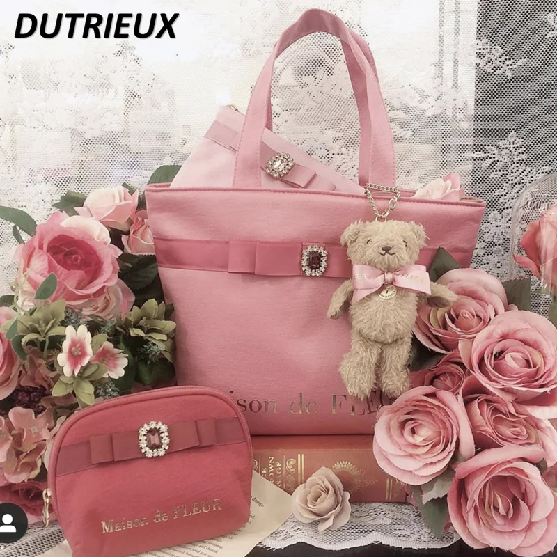 Женская сумка с розовым бантом в японском стиле Лолита, модная Милая портативная Повседневная сумка, летние и осенние Дорожные Сумки для дам
Женская сумка с розовым бантом в японском стиле Лолита, модная Милая портативная Повседневная сумка, летние и осенние Дорожные Сумки для дам