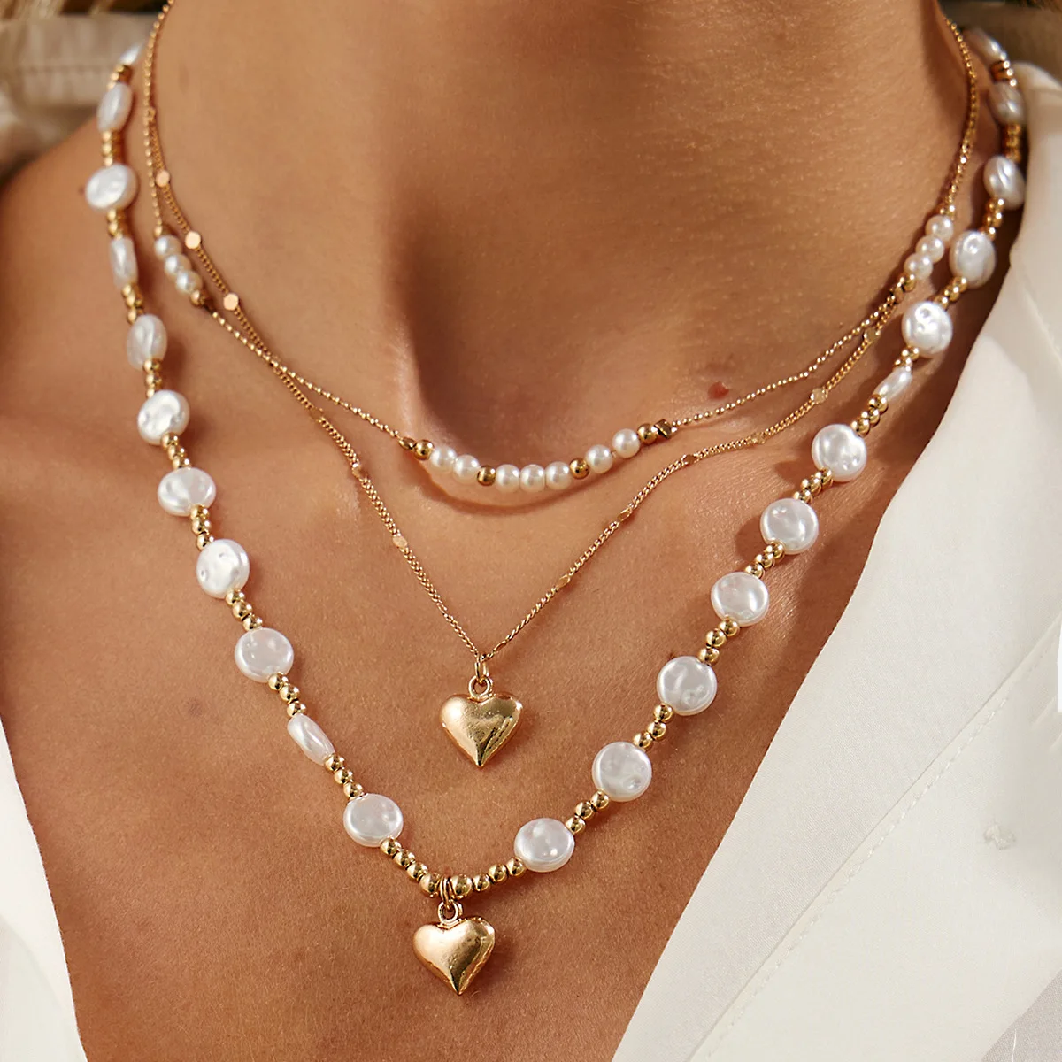 Heart Pendant Necklace Faux Pearl Beaded Layered Collection Premium Gold Tone Daily Wear Versatile Jewelry for Women
Heart Pendant Necklace Faux Pearl Beaded Layered Collection Premium Gold Tone Daily Wear Versatile Jewelry for Women
