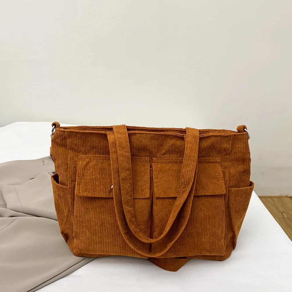 Trendy Large Capacity Corduroy Tote Bag Elegant Pure Color Multi-pocket Shoulder Bag Handbag Vintage Casual Underarm Bag Travel
Trendy Large Capacity Corduroy Tote Bag Elegant Pure Color Multi-pocket Shoulder Bag Handbag Vintage Casual Underarm Bag Travel