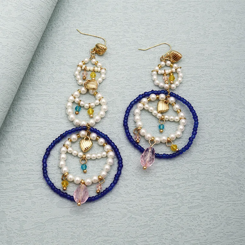 Niche Design Vacation Boho Style High-end Star's Same Earrings Freshwater Pearl Circle Tassel Retro Long Hoop Earrings
Niche Design Vacation Boho Style High-end Star's Same Earrings Freshwater Pearl Circle Tassel Retro Long Hoop Earrings