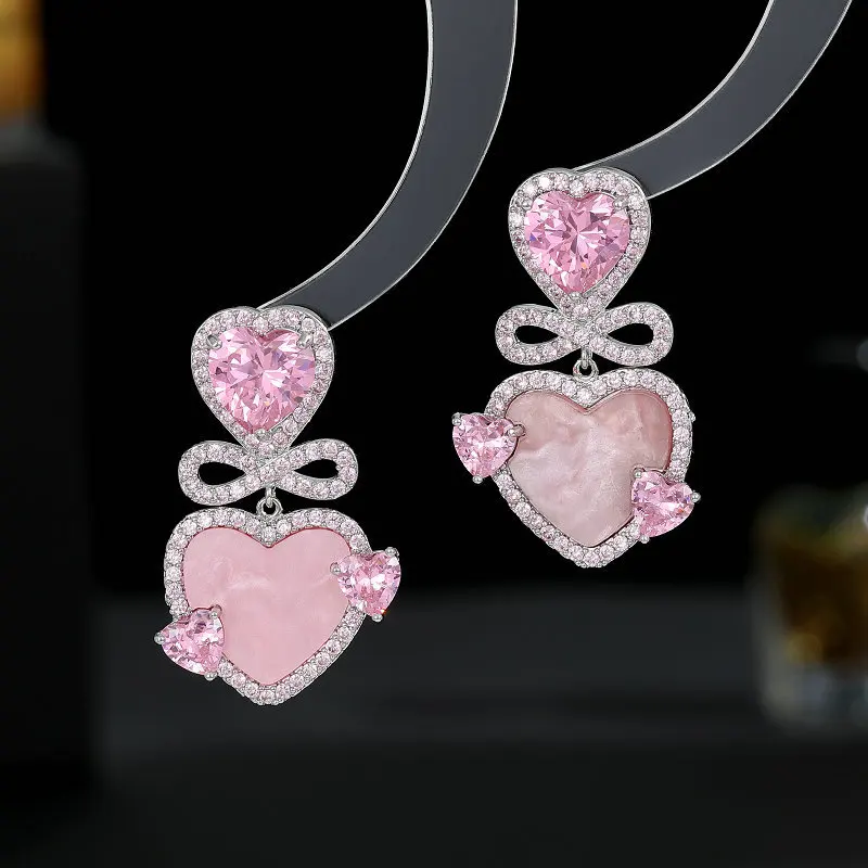 New Fashion Super Fairy Temperament Light Luxury Trendy High-end Bow Sweet Pink Heart-shaped Earrings
New Fashion Super Fairy Temperament Light Luxury Trendy High-end Bow Sweet Pink Heart-shaped Earrings
