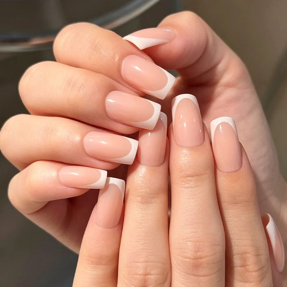 24Pcs fake nail art, mid size white edge fake nail nude color white French style simple and versatile wearable nail, anniversary gift, perfect gift for women, birthday gift, holiday gift
24Pcs fake nail art, mid size white edge fake nail nude color white French style simple and versatile wearable nail, anniversary gift, perfect gift for women, birthday gift, holiday gift