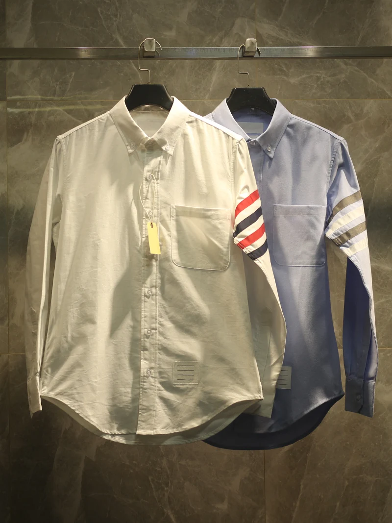 Элитная повседневная рубашка из оксфордской ткани в полоску с четырьмя полосками, модная, из смесового хлопка, с длинными рукавами, на пуговицах
Элитная повседневная рубашка из оксфордской ткани в полоску с четырьмя полосками, модная, из смесового хлопка, с длинными рукавами, на пуговицах