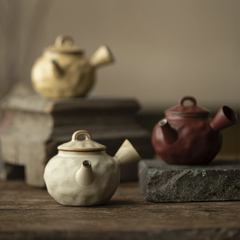 Japanese-style coarse pottery side handle teapot household wabi sandy wind kung fu tea set teapot antique pot
Japanese-style coarse pottery side handle teapot household wabi sandy wind kung fu tea set teapot antique pot