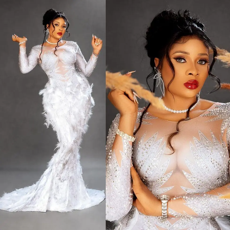 Sexy Feather Mermaid Wedding Dress Scoop Neck Plus Size Crystal Bridal Gowns Long Sleeve Beads Bride robes de mariée
Sexy Feather Mermaid Wedding Dress Scoop Neck Plus Size Crystal Bridal Gowns Long Sleeve Beads Bride robes de mariée