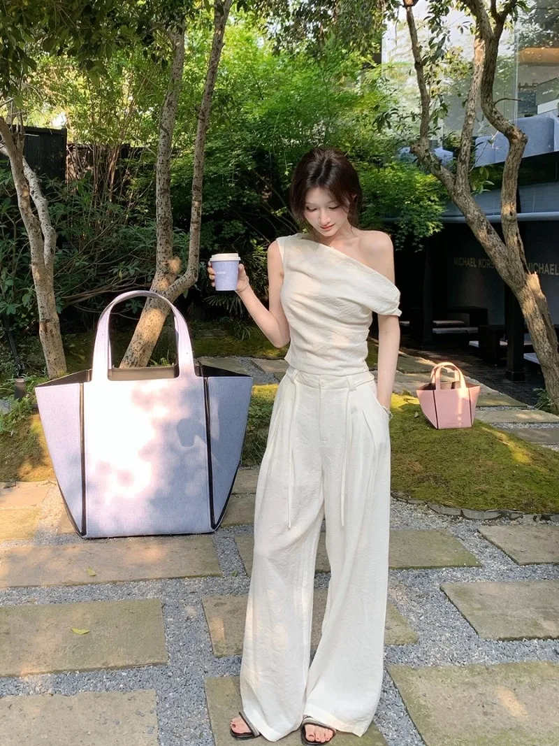 Casual Cotton Linen Set Women's Summer Off Shoulder Short-sleeved T-shirt High Waist Wide Leg Pants Two-piece Set Female Clothes
Casual Cotton Linen Set Women's Summer Off Shoulder Short-sleeved T-shirt High Waist Wide Leg Pants Two-piece Set Female Clothes