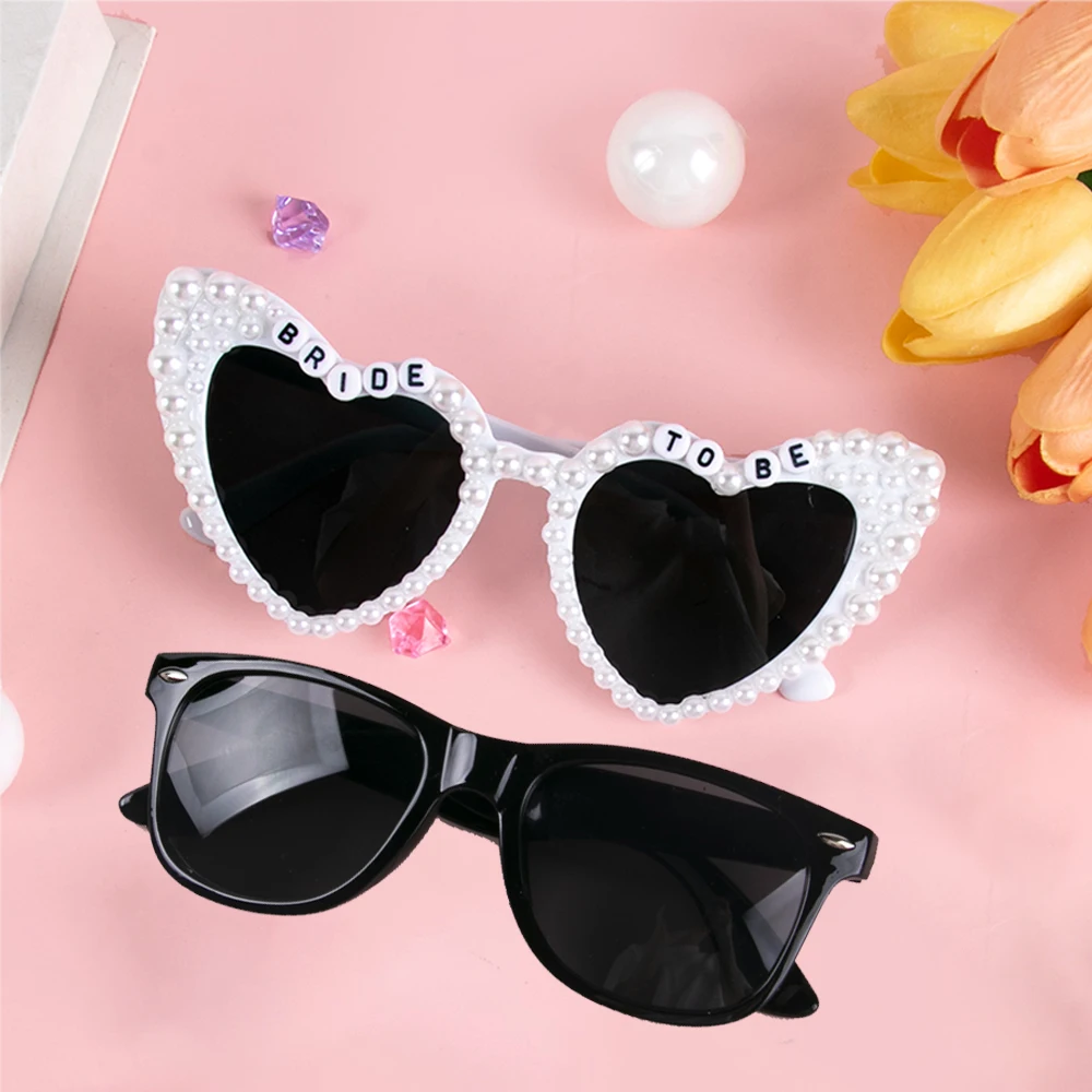2pcs Pearl Decoration Heart Pearl bride to be Sun Glasses black Glasses Wedding Party Couple Sunglasses Bachelorette Party Decor
2pcs Pearl Decoration Heart Pearl bride to be Sun Glasses black Glasses Wedding Party Couple Sunglasses Bachelorette Party Decor