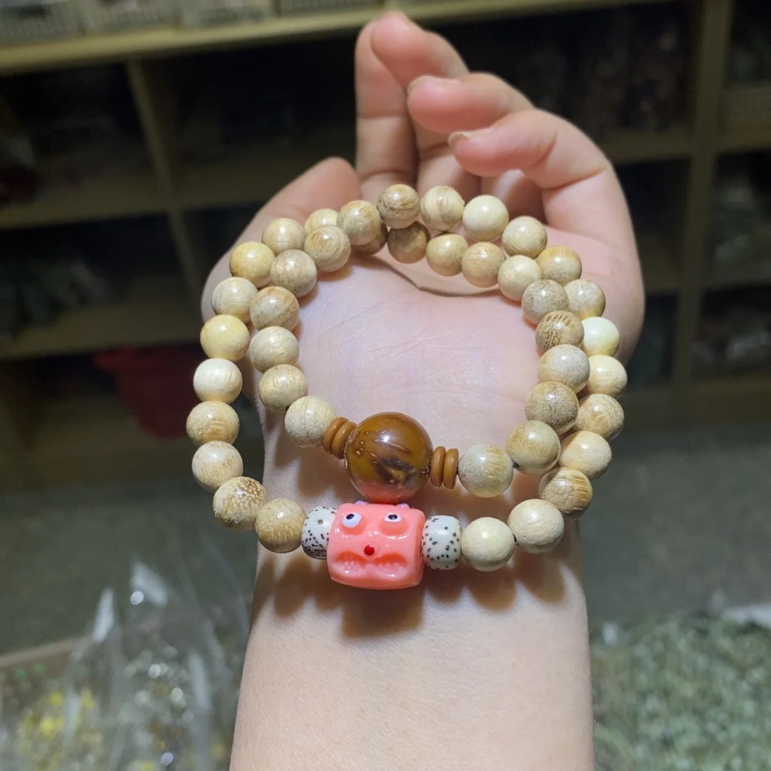 Milk fragrant wood double circle bracelet, wooden cultural play bracelet, fashionable boutique, cute bead diameter is about 8mm,
Milk fragrant wood double circle bracelet, wooden cultural play bracelet, fashionable boutique, cute bead diameter is about 8mm,