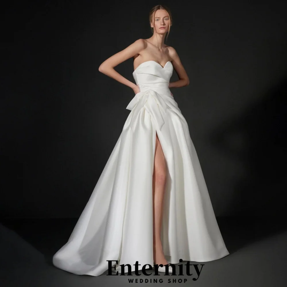 Customized Charming Sweetheart Ruched Wedding Dress A-line Bow Sleeveless Bridal Gown Strap With High Split Vestidos De Novia
Customized Charming Sweetheart Ruched Wedding Dress A-line Bow Sleeveless Bridal Gown Strap With High Split Vestidos De Novia
