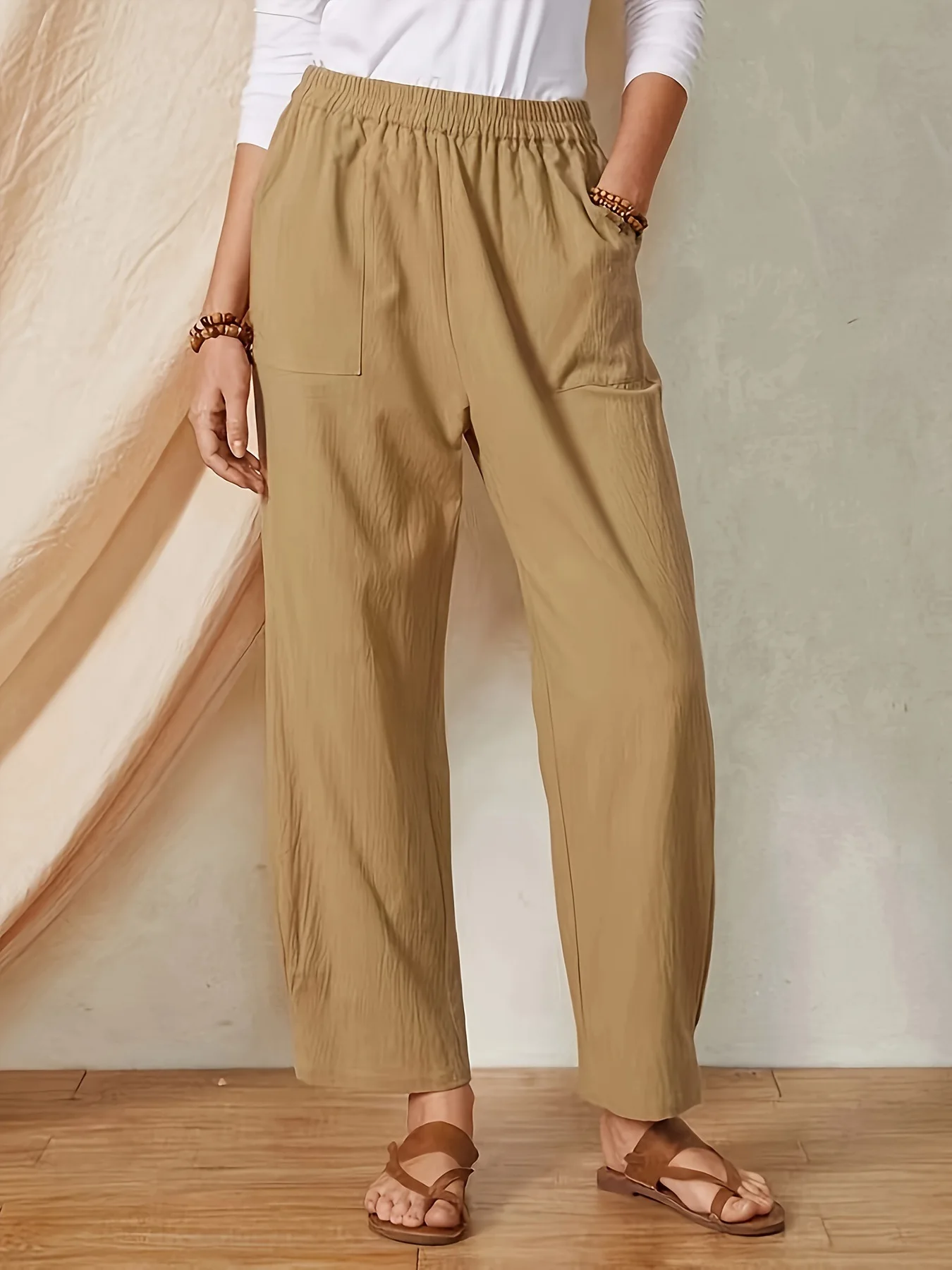 Spring and summer new solid color pocket elastic waist cotton and linen loose casual wide-leg trousers for women
Spring and summer new solid color pocket elastic waist cotton and linen loose casual wide-leg trousers for women