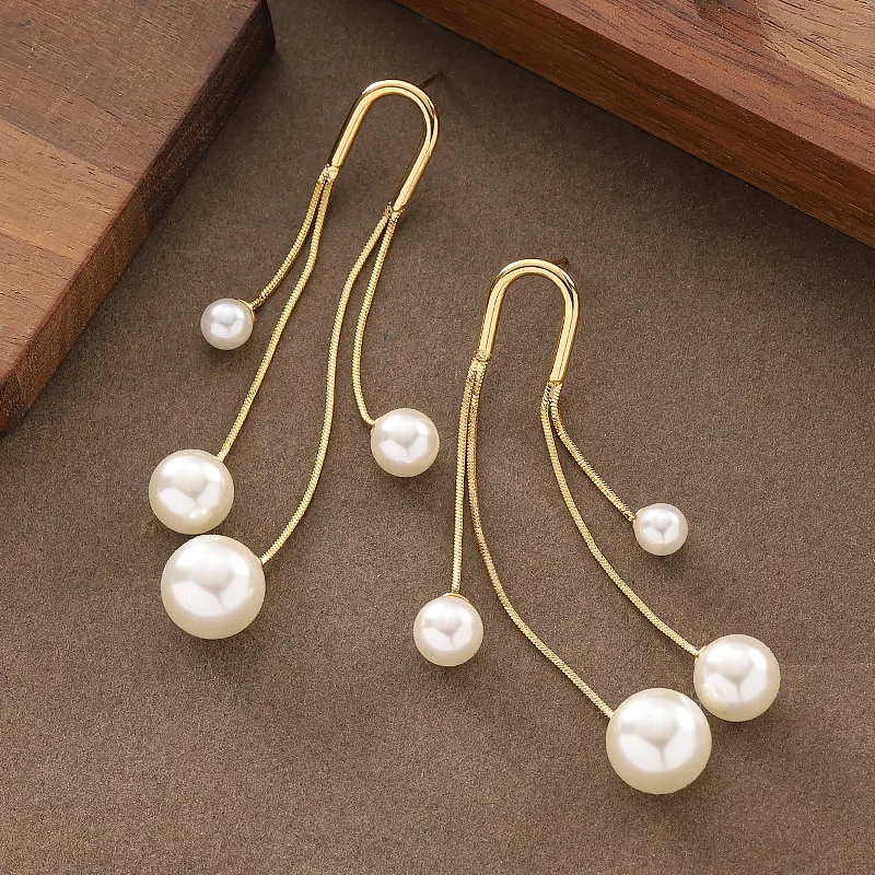 Stylish, exquisite, fresh and sweet, resort-style long tassel pearl earrings, elegant, simple, face-slimming commuting earrings
Stylish, exquisite, fresh and sweet, resort-style long tassel pearl earrings, elegant, simple, face-slimming commuting earrings