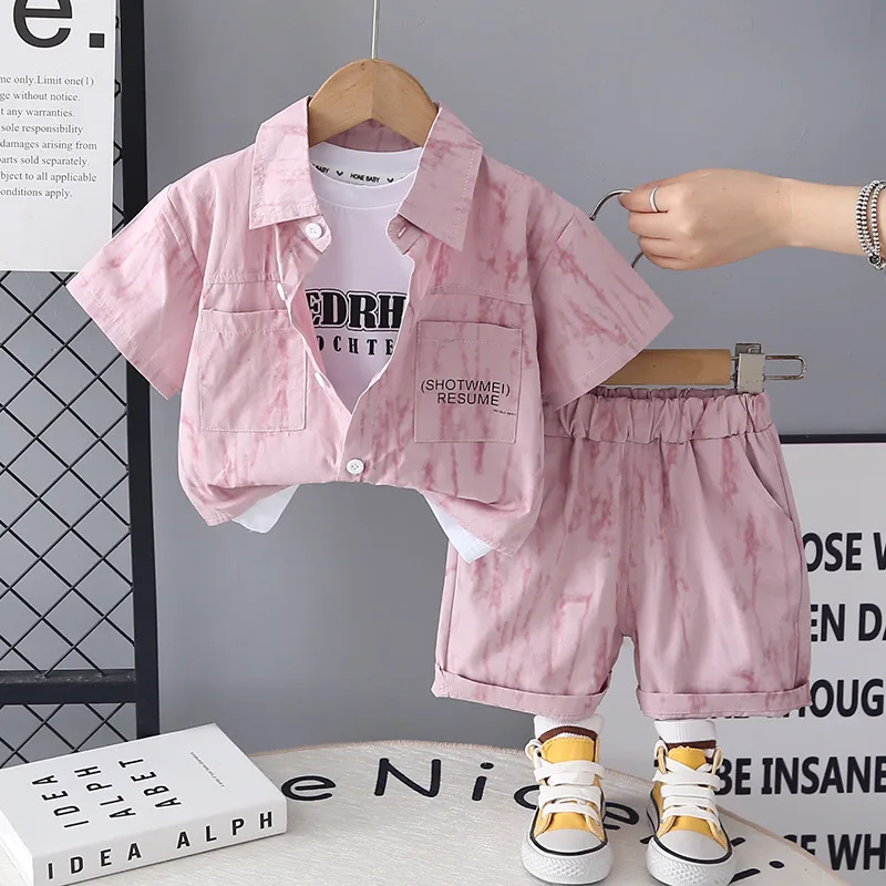 Летний комплект для мальчиков 2026: Новая корейская повседневная рубашка + белая футболка с коротким рукавом + шорты, 3 предмета, детский костюм
Летний комплект для мальчиков 2026: Новая корейская повседневная рубашка + белая футболка с коротким рукавом + шорты, 3 предмета, детский костюм