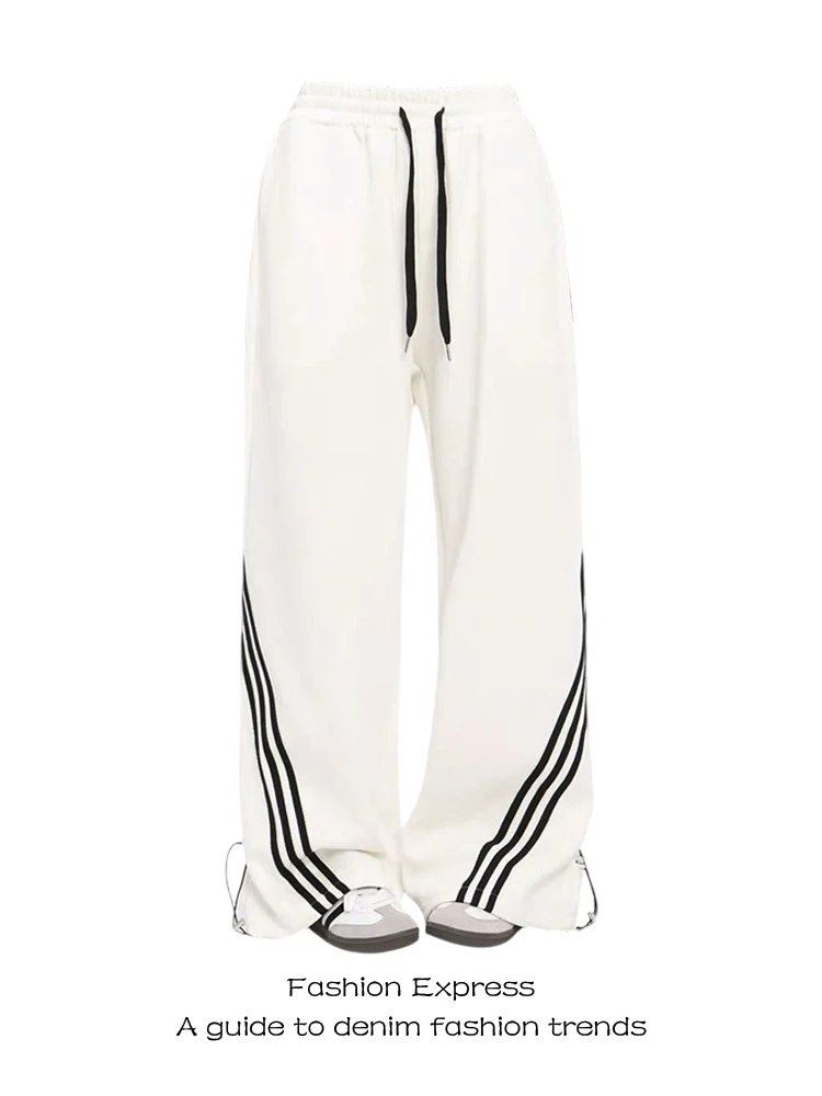 Американские уличные повседневные брюки для женщин, с высокой талией, широкими штанинами, свободного кроя, осенне-зимние, белые, с эластичным поясом
Американские уличные повседневные брюки для женщин, с высокой талией, широкими штанинами, свободного кроя, осенне-зимние, белые, с эластичным поясом