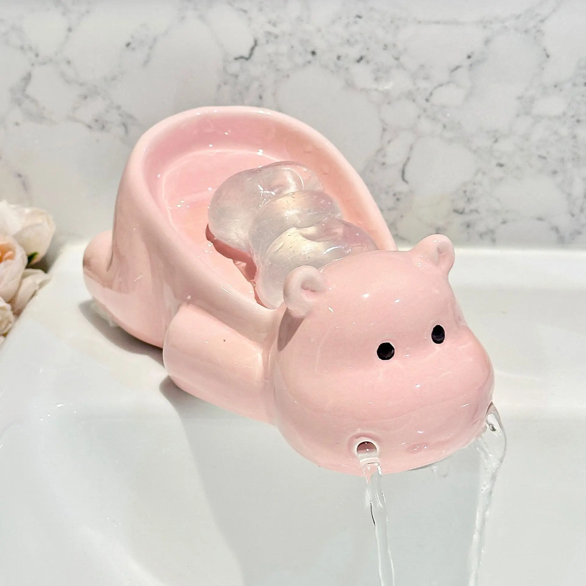 creative and cute ceramic soap dish Hippopotamus soap box draining soap storage rack no water accumulation in bathroom
creative and cute ceramic soap dish Hippopotamus soap box draining soap storage rack no water accumulation in bathroom