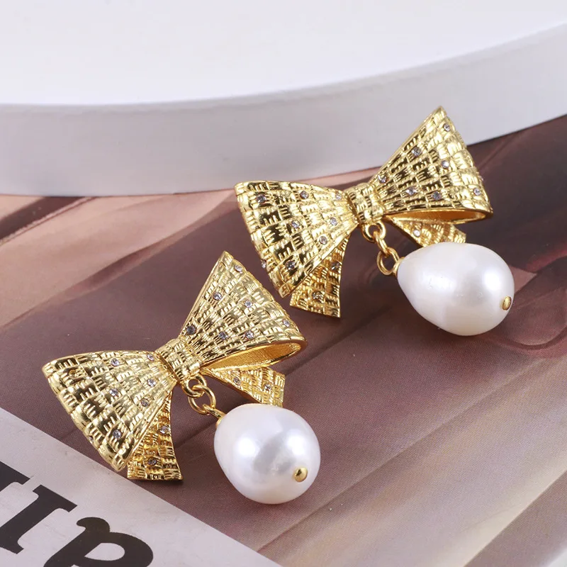 Cute Sweet Temperament Bowknot Shape Age-reducing Fashion Freshwater Pearl Earrings for Women
Cute Sweet Temperament Bowknot Shape Age-reducing Fashion Freshwater Pearl Earrings for Women