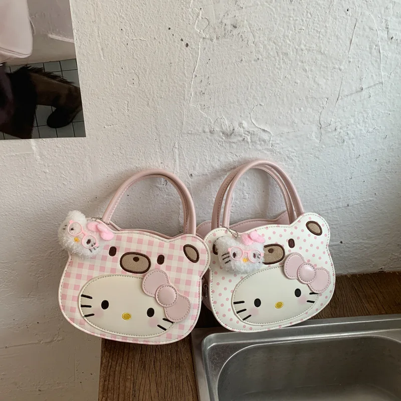 Kawaii Hellokitty Polka Dot Handbag Cute Girly Style New Fashion Versatile Commuter Travel Single Shoulder Crossbody Bag
Kawaii Hellokitty Polka Dot Handbag Cute Girly Style New Fashion Versatile Commuter Travel Single Shoulder Crossbody Bag