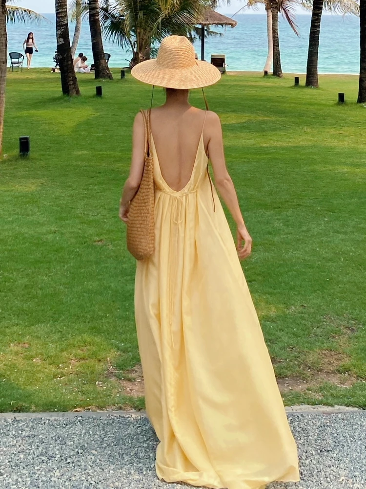 Yellow Camisole Backless Dress Loose Elastic Waist A-line Fairy Dresses Fashion Beach Vacation Beach Dress Summer Women's New
Yellow Camisole Backless Dress Loose Elastic Waist A-line Fairy Dresses Fashion Beach Vacation Beach Dress Summer Women's New