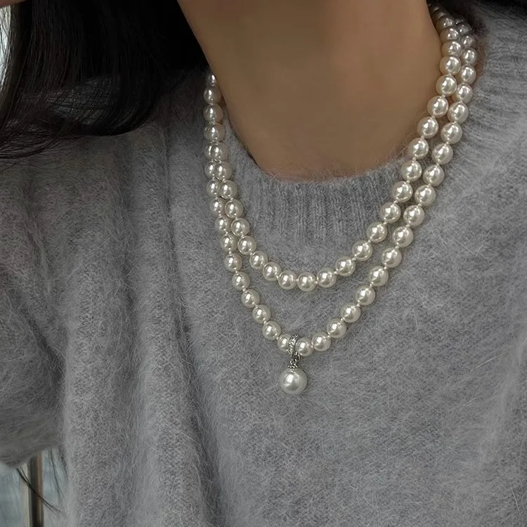 Autumn and winter classic white pearl long French knotted necklace light luxury niche sweater chain 2024 new
Autumn and winter classic white pearl long French knotted necklace light luxury niche sweater chain 2024 new