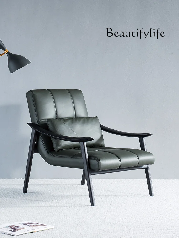 Italian light luxury modern minimalist leather sofa chair solid wood recliner with pedal leisure design new 
Italian light luxury modern minimalist leather sofa chair solid wood recliner with pedal leisure design new