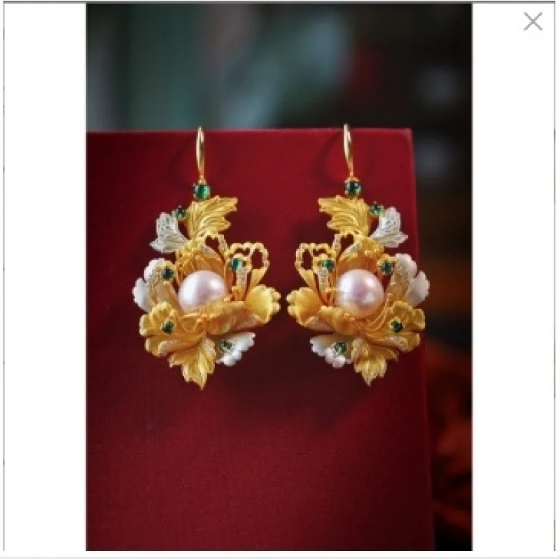 Gilt imitation jadeite filigree inlaid "Joy on the Eyebrows" earrings, a traditional cultural heritage, crafted with meticulous
Gilt imitation jadeite filigree inlaid "Joy on the Eyebrows" earrings, a traditional cultural heritage, crafted with meticulous