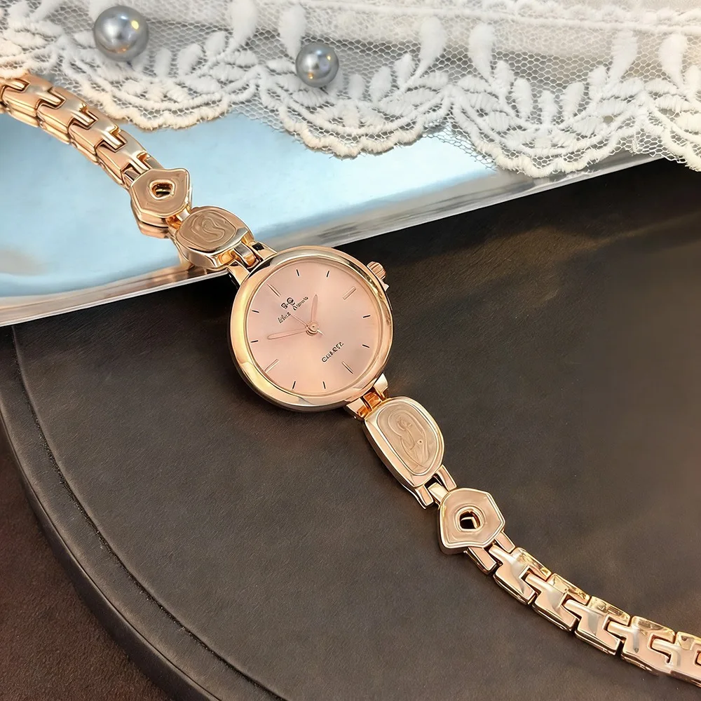 Винтажные женские наручные часы с необычным дизайном, в виде браслета, с кнопкой-застежкой, элегантные, металлические, подарочные
Винтажные женские наручные часы с необычным дизайном, в виде браслета, с кнопкой-застежкой, элегантные, металлические, подарочные